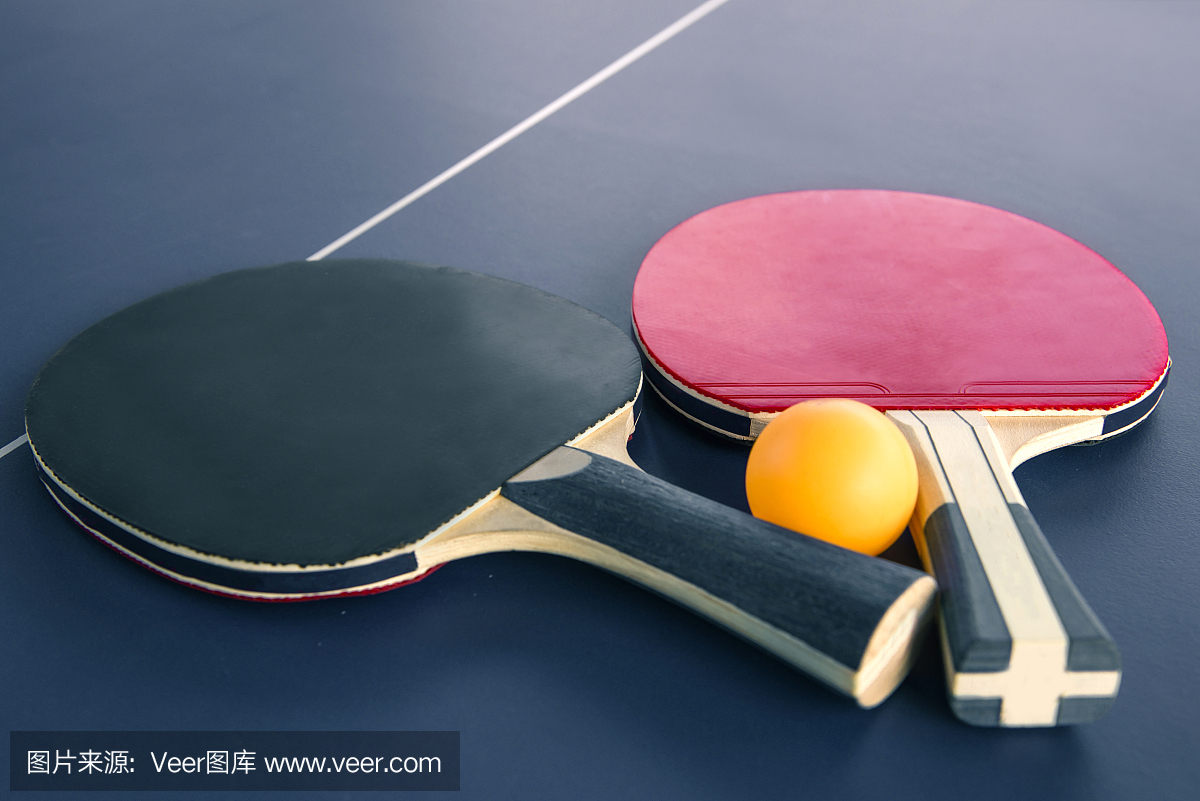 Tabletennis or ping pong rackets and balls on t