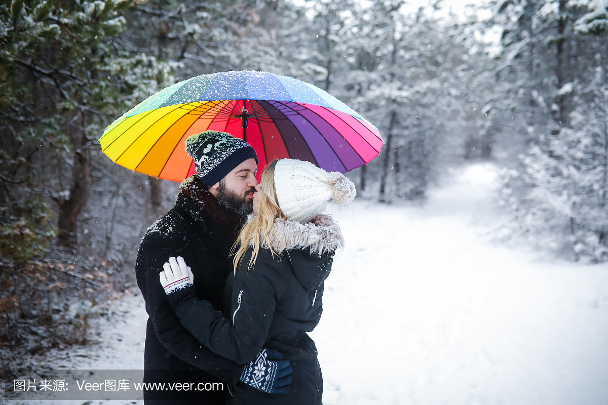 Couple in love with colorful umbrella
