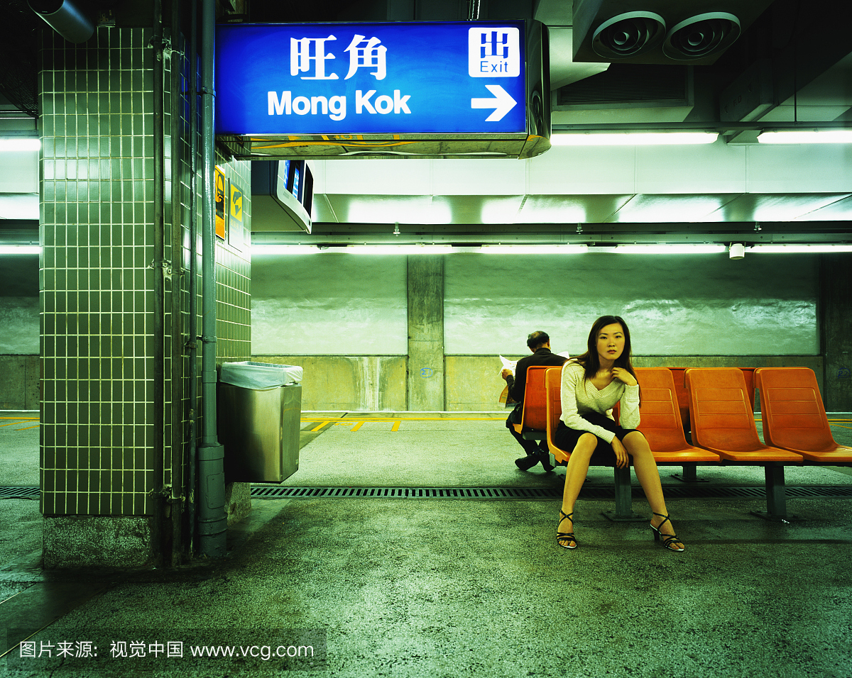 Woman Waiting for Subway