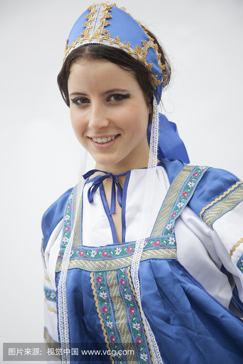 iling woman in traditional clothing from Russia, 