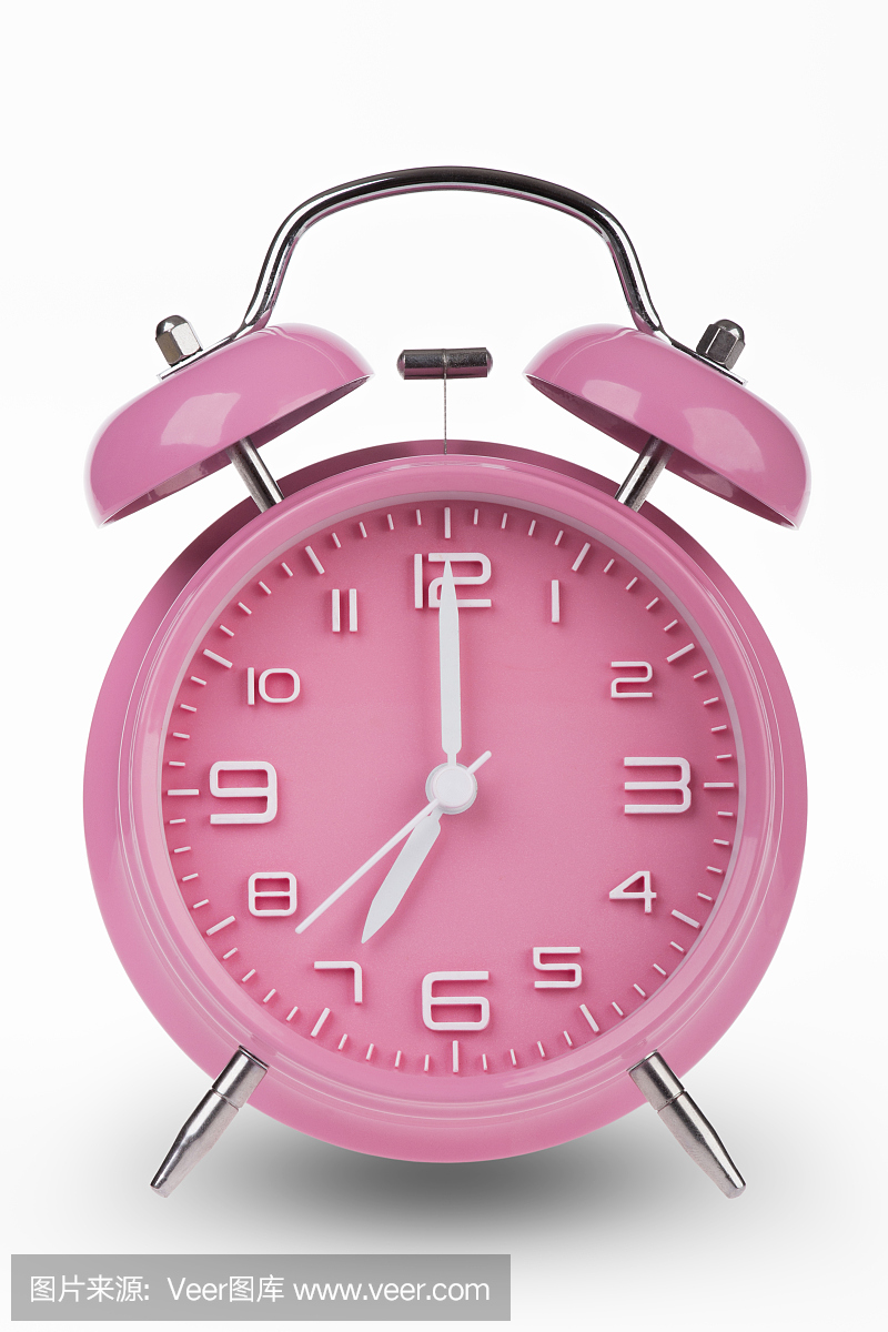 粉红色的闹钟,手上午7点或下午