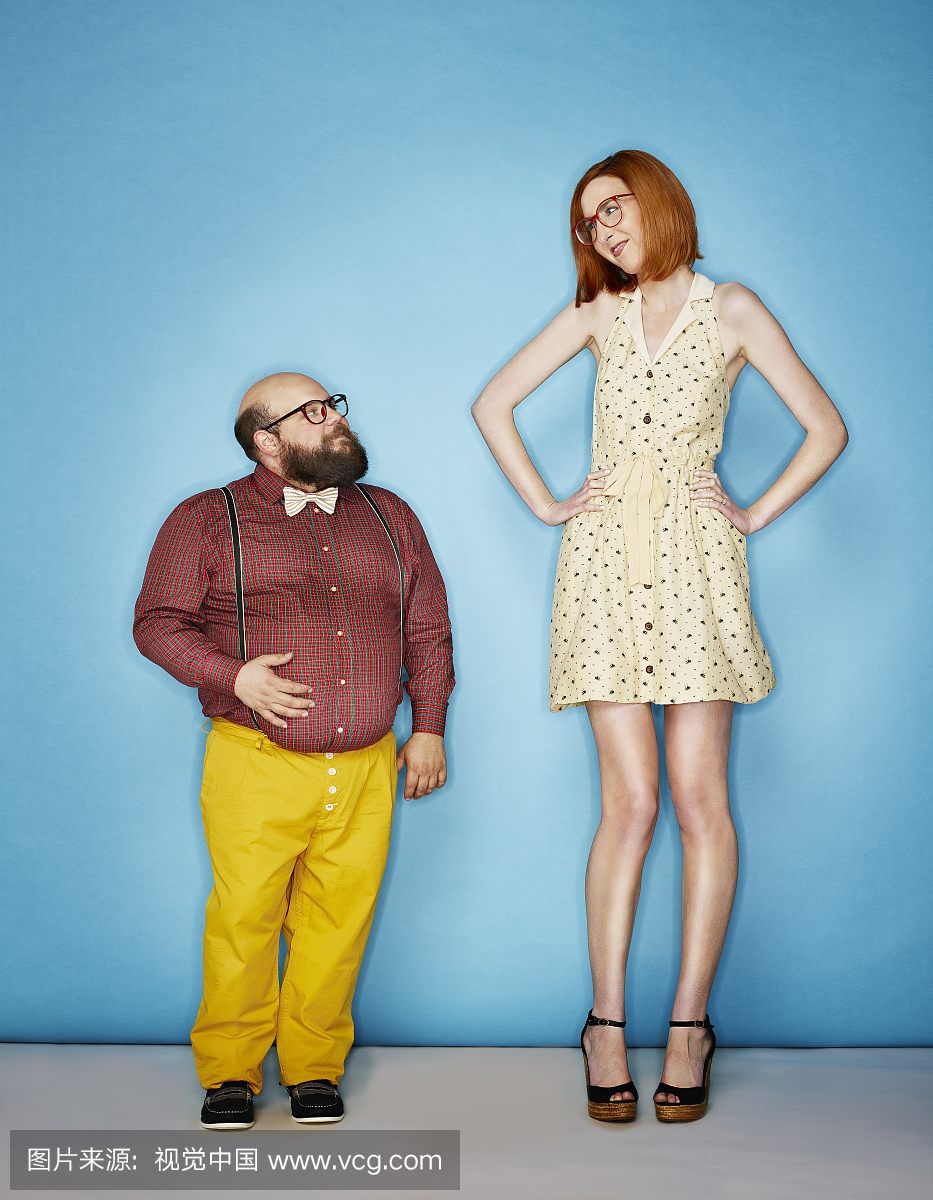 Tall woman and short man