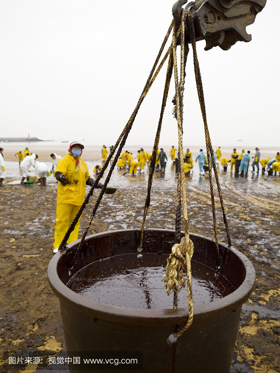 浮油,粗棉布裤,白昼,环境损害