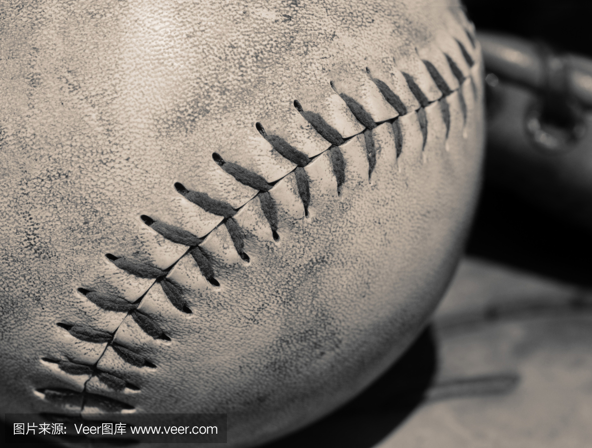 在一个棒球缝合的棕褐色特写镜头。